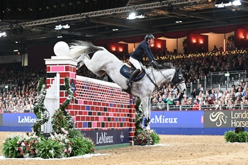 Guy Williams and Mr Blue Sky UK lift their third consecutive Puissance title at the London International Horse Show Guy Williams and Mr Blue Sky UK lift their third consecutive Puissance title at the London International Horse Show